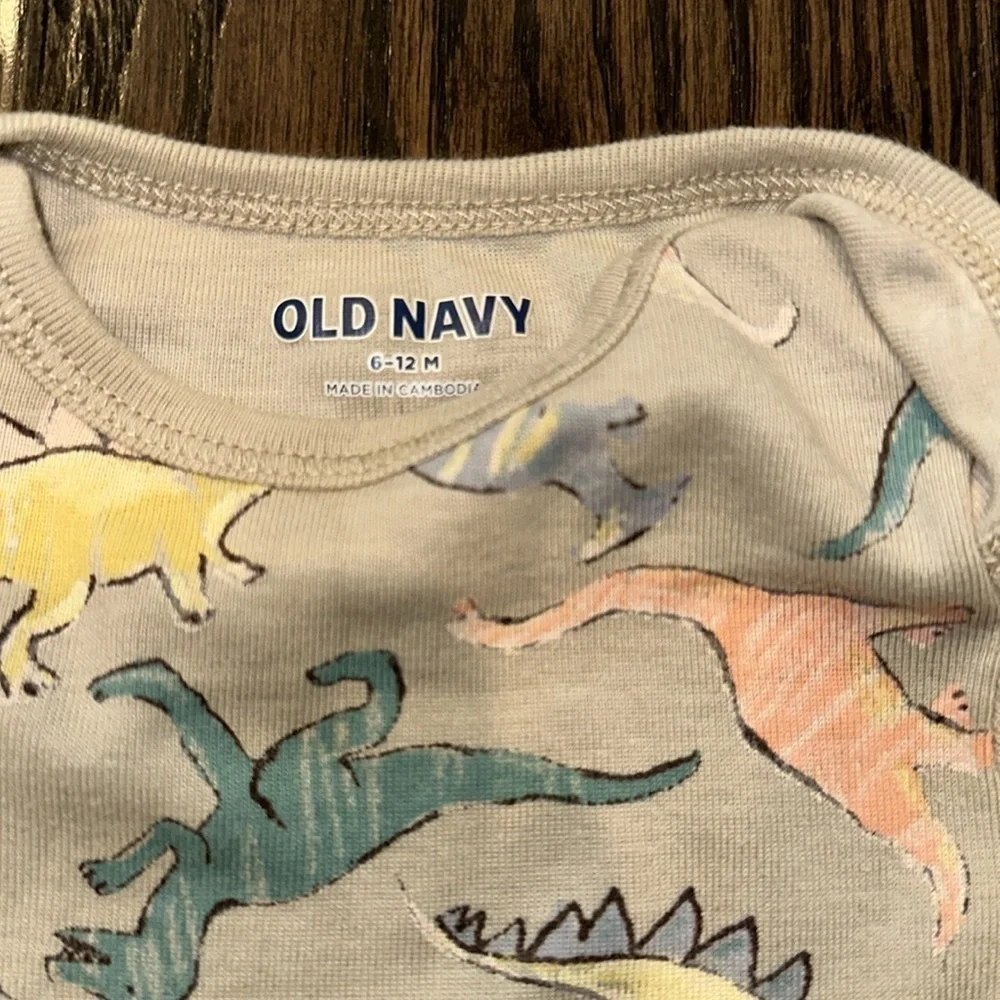Old Navy one piece with Playful Dinosaur Print size 6-12 months